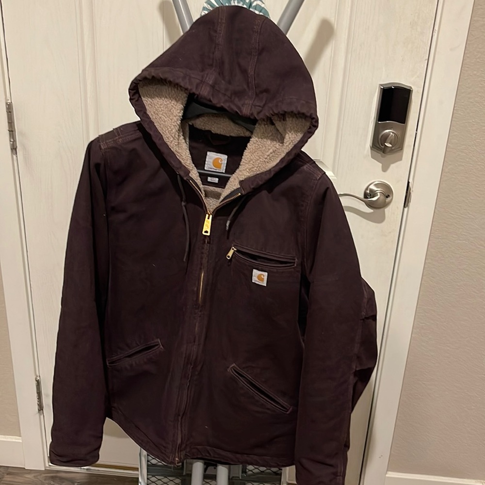 Winter coat, Carhart, wine in color. Looks dark brown.